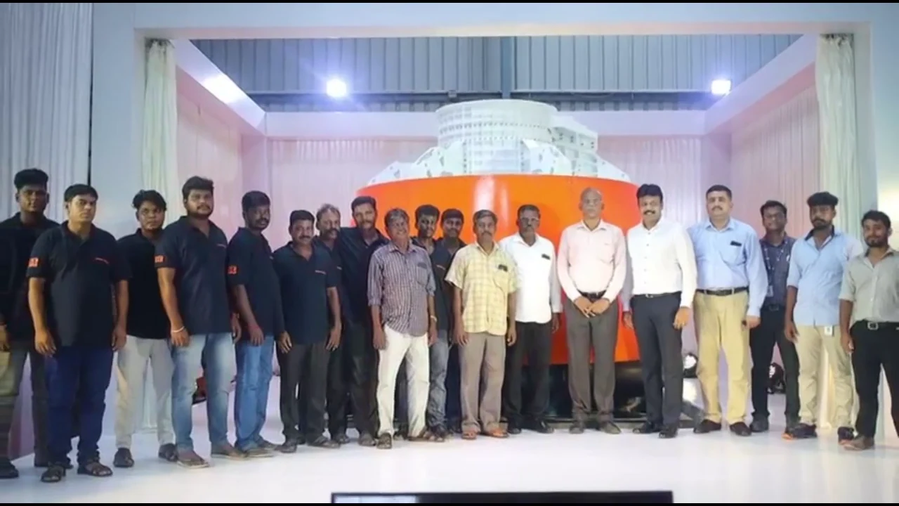 Madras Swastic Engineers team in front of a Gaganyaan crew module